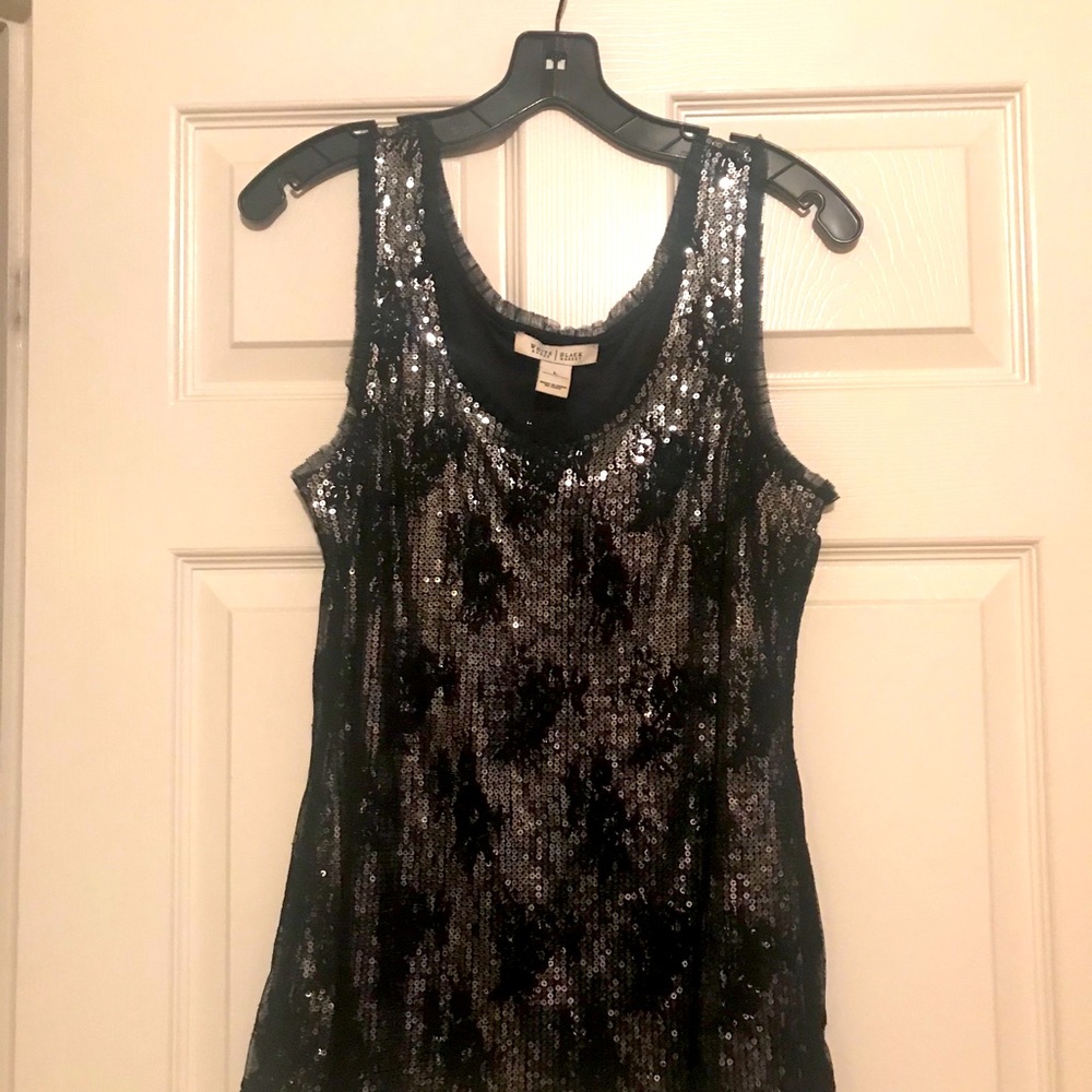 Black shimmering top good with jeans